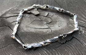 Обережный браслет косичка из серебра (d 4.5 мм) 