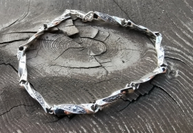 Обережный браслет косичка из серебра (d 4.5 мм) 